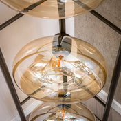 Sollara 4-lichts - vloerlamp met amberkleurig glas