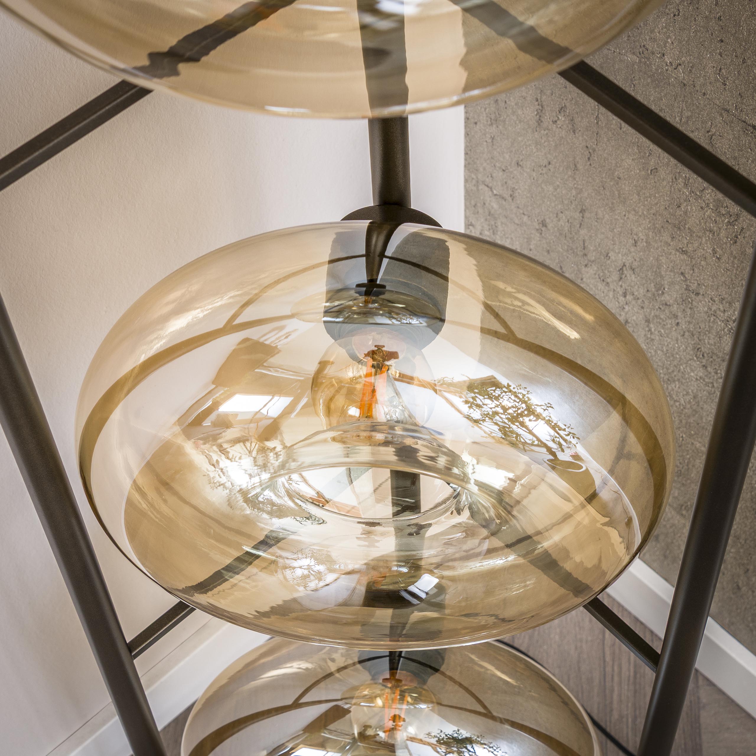 Sollara 4-lichts - vloerlamp met amberkleurig glas