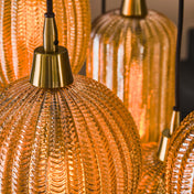 Varion 4+3-licht - Amberkleurige glazen hanglamp