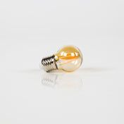 Fannur gloeilamp LED [G45] filament bol Ø4.5cm / Amber glas