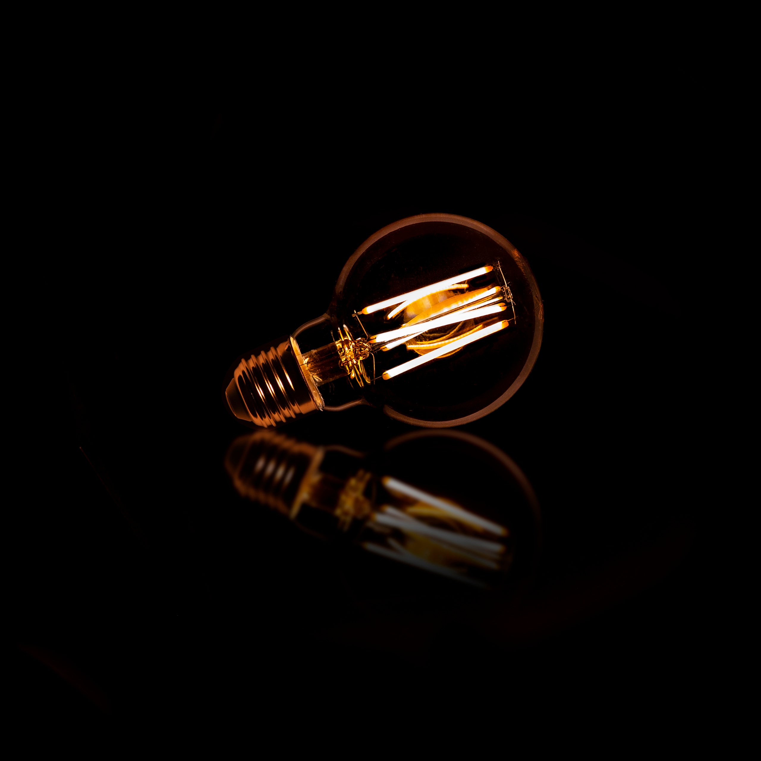 Fannur gloeilamp LED [G70] filament bol Ø7cm / Amber glas