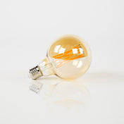 Fannur gloeilamp LED [G95] filament globe Ø9,5cm / Amber glas