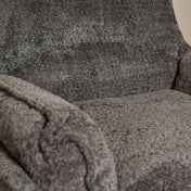 Lunara dark grey bouclé swivel armchair